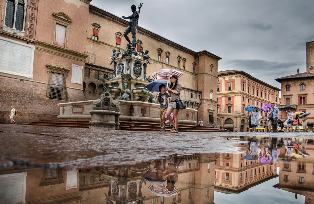 Piazza Maggiore in Bologna under the rain