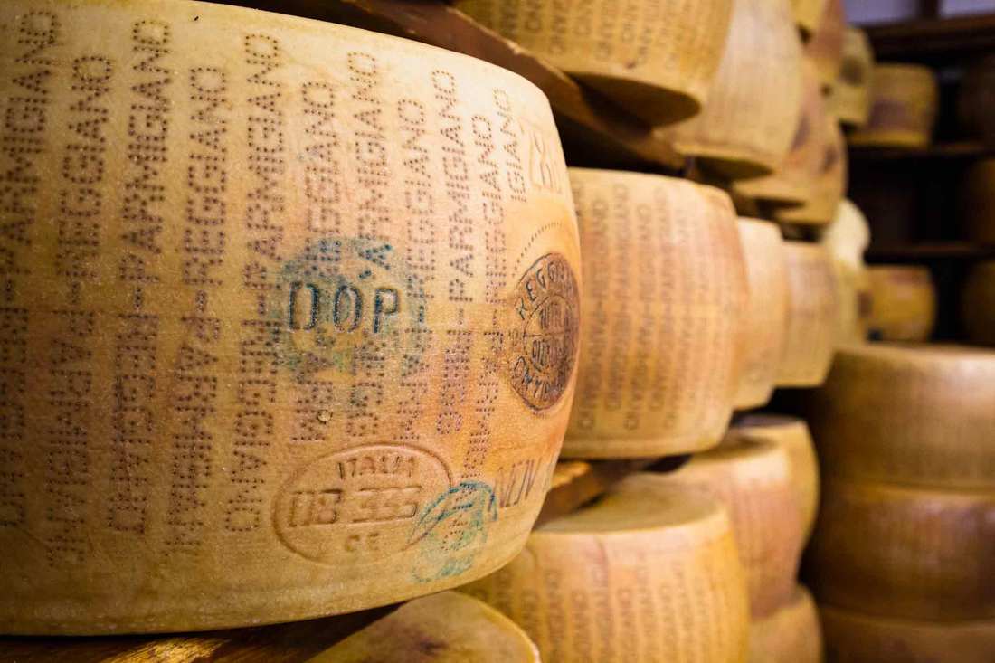 Parmigiano Reggiano cheese - aging wood shelves