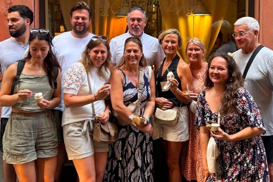 Group of friends with gelato during a Bologna food tour