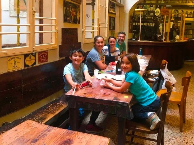 A family inside Osteria del Sole in Bologna during a private tour