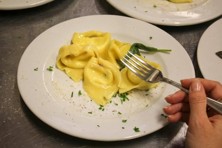 Pasta tortelloni spinach ricotta bologna